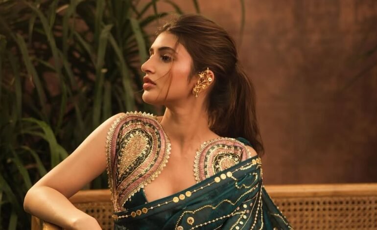 Sreeleela’s emerald-green sari comes with pearl embellishments and gold sequins